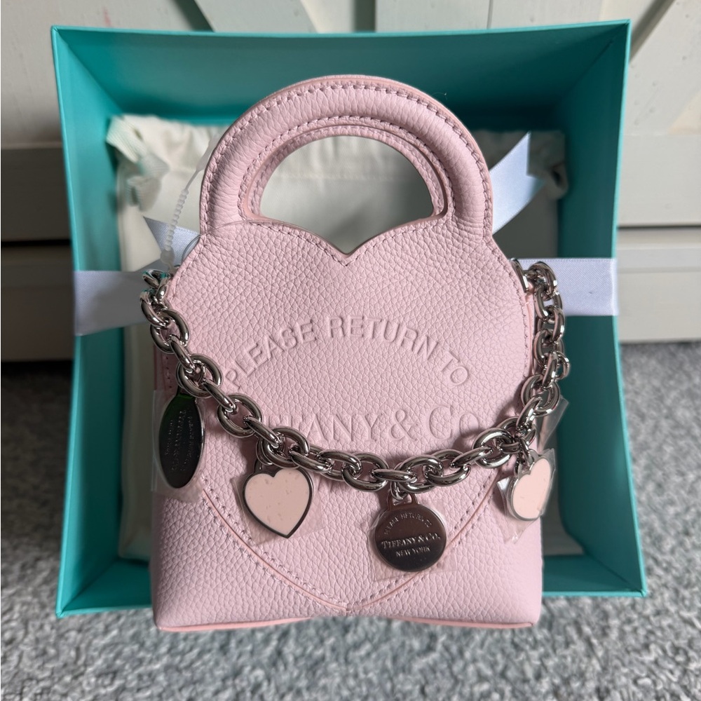 TIFFANY & CO. RETURN TO TIFFANY MICRO PURSE LIGHT PINK WITH CHARMS